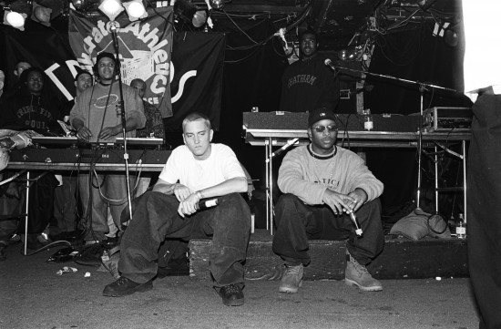 NEW YORK - MARCH 1999:  Rappers Eminem, left, and Royce Da 5'9", right, with unidentified rappers and DJs on turntables in background, perform at Tramps in March 1999 in New York City, New York. (Photo by Catherine McGann/Getty Images)