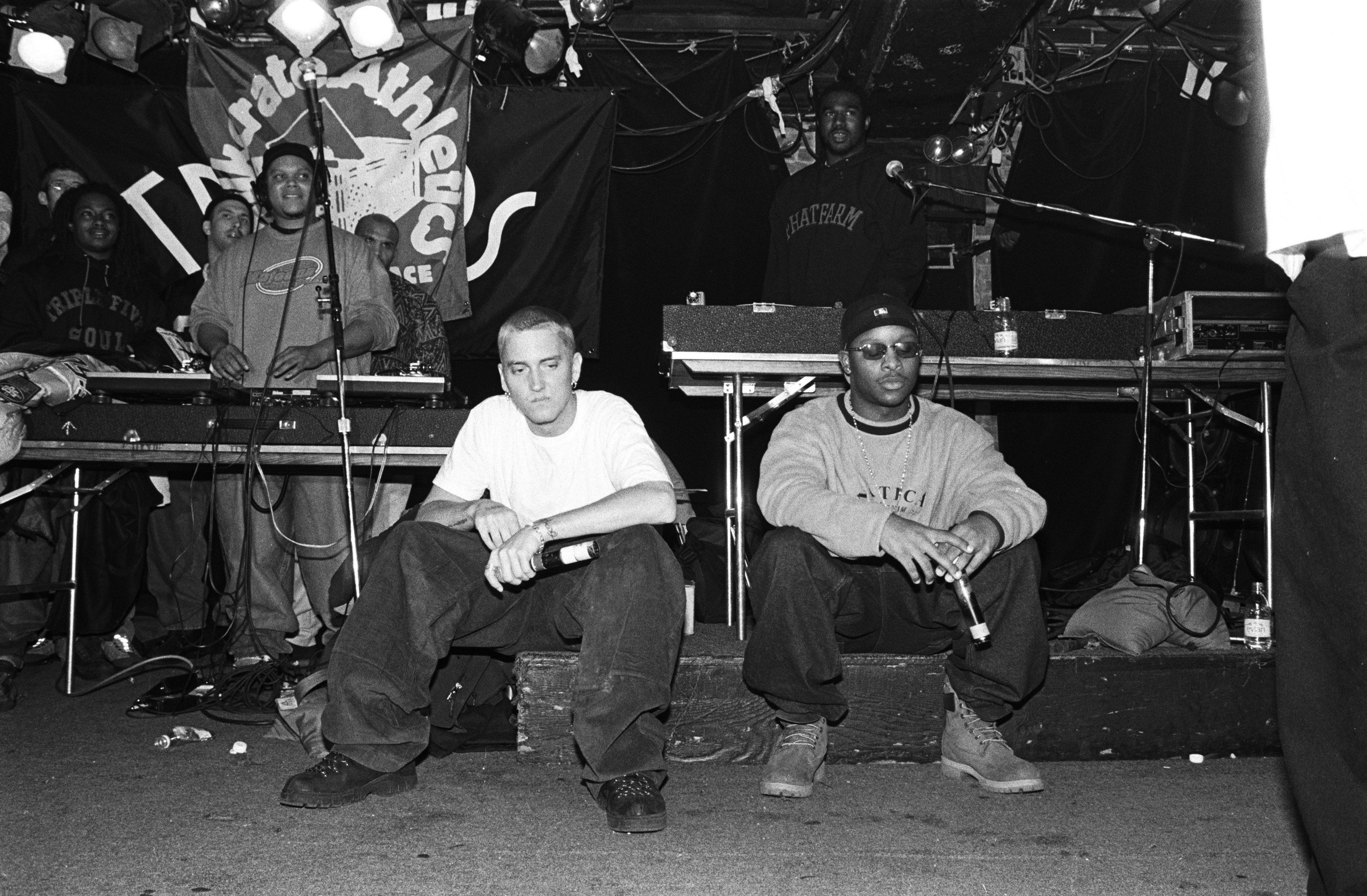 NEW YORK - MARCH 1999: Rappers Eminem, left, and Royce Da 5'9", right, with unidentified rappers and DJs on turntables in background, perform at Tramps in March 1999 in New York City, New York. (Photo by Catherine McGann/Getty Images)