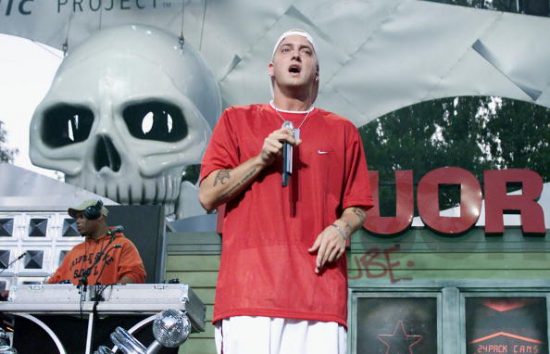 Rapper Eminem performs live at Memorial Stadium to celebrate the opening of the Experience Music Project, an interactive music museum opening in Seattle, Washington, June 23, 2000. (Photo by Kevin Winter/Getty Images)