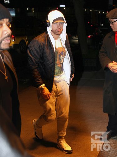 Rapper Eminem returns back to his hotel after spending some time in the recording studio in New York City. Real name Marshall Mathers is set to release his new album 'Revival' and will be performing on SNL on November 18th, 2017.