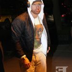 Rapper Eminem returns back to his hotel after spending some time in the recording studio in New York City. Real name Marshall Mathers is set to release his new album 'Revival' and will be performing on SNL on November 18th, 2017.