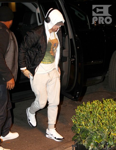Rapper Eminem returns back to his hotel after spending some time in the recording studio in New York City. Real name Marshall Mathers is set to release his new album 'Revival' and will be performing on SNL on November 18th, 2017.