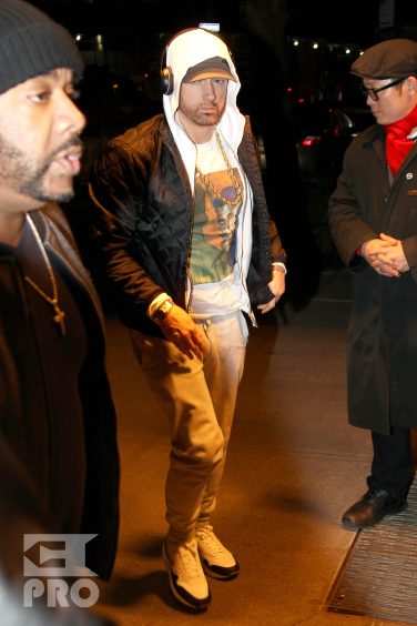 Rapper Eminem returns back to his hotel after spending some time in the recording studio in New York City. Real name Marshall Mathers is set to release his new album 'Revival' and will be performing on SNL on November 18th, 2017.
