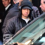 EXCLUSIVE: Eminem is notorious for his low-key lifestyle, so seeing him in public in NYC on Thursday was extremely rare. The rapper went incognito in a jacket, hoodie and baseball cap as he left a hotel in Manhattan surrounded by security guards. His face could be seen under his cap, and he appeared to be extremely tired, as he headed to an early morning rehearsal for Saturday Night Live.