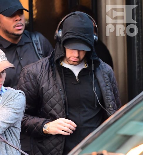 EXCLUSIVE: Eminem is notorious for his low-key lifestyle, so seeing him in public in NYC on Thursday was extremely rare. The rapper went incognito in a jacket, hoodie and baseball cap as he left a hotel in Manhattan surrounded by security guards. His face could be seen under his cap, and he appeared to be extremely tired, as he headed to an early morning rehearsal for Saturday Night Live.