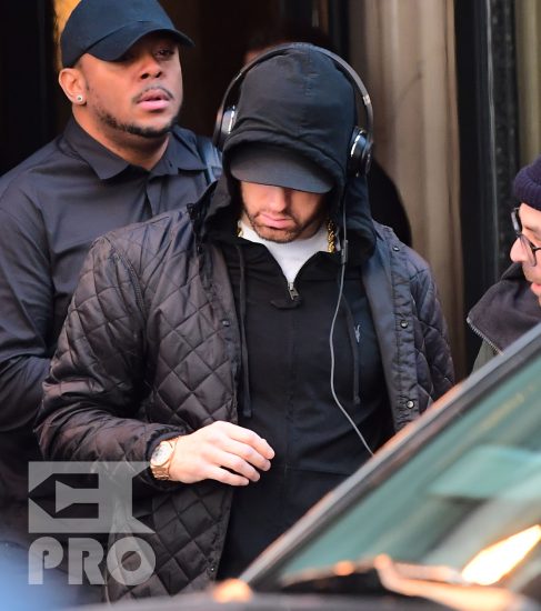 EXCLUSIVE: Eminem is notorious for his low-key lifestyle, so seeing him in public in NYC on Thursday was extremely rare. The rapper went incognito in a jacket, hoodie and baseball cap as he left a hotel in Manhattan surrounded by security guards. His face could be seen under his cap, and he appeared to be extremely tired, as he headed to an early morning rehearsal for Saturday Night Live.