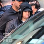 EXCLUSIVE: Eminem is notorious for his low-key lifestyle, so seeing him in public in NYC on Thursday was extremely rare. The rapper went incognito in a jacket, hoodie and baseball cap as he left a hotel in Manhattan surrounded by security guards. His face could be seen under his cap, and he appeared to be extremely tired, as he headed to an early morning rehearsal for Saturday Night Live.