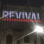 На зданиях в Детройте разместили логотип и обложку альбома «Revival»