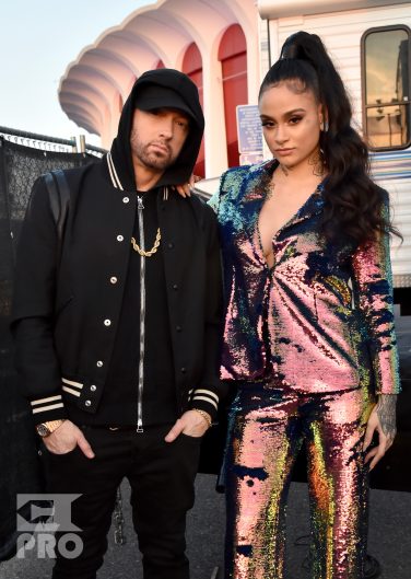 INGLEWOOD, CA - MARCH 11: Eminem (L) and Kehlani during the 2018 iHeartRadio Music Awards which broadcasted live on TBS, TNT, and truTV at The Forum on March 11, 2018 in Inglewood, California. (Photo by Kevin Mazur/Getty Images for iHeartMedia)