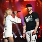 INDIO, CA - APRIL 15: Skylar Grey (L) and Eminem perform onstage during the 2018 Coachella Valley Music and Arts Festival Weekend 1 at the Empire Polo Field on April 15, 2018 in Indio, California. (Photo by Kevin Winter/Getty Images for Coachella)