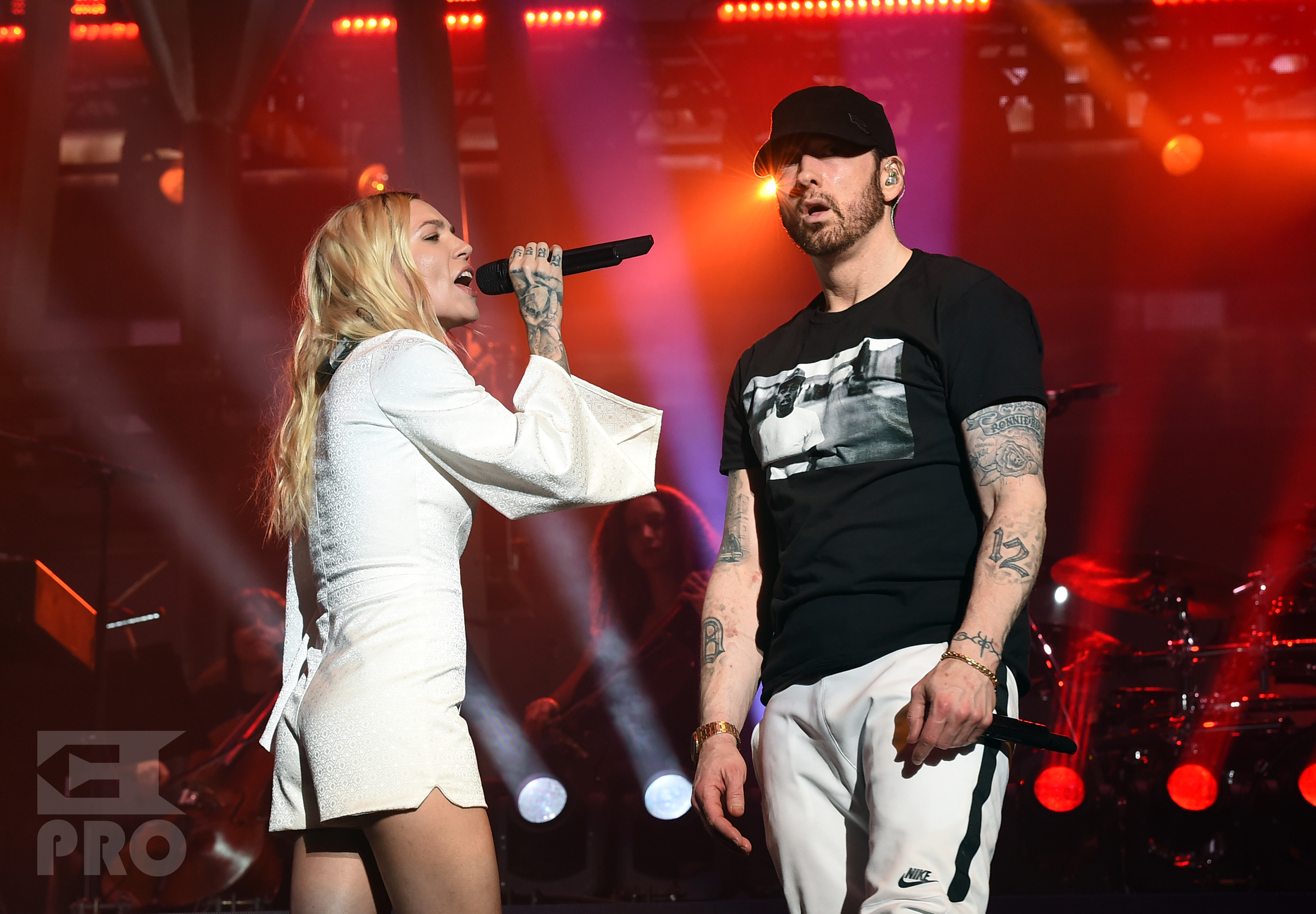 INDIO, CA - APRIL 15: Skylar Grey (L) and Eminem perform onstage during the 2018 Coachella Valley Music and Arts Festival Weekend 1 at the Empire Polo Field on April 15, 2018 in Indio, California. (Photo by Kevin Winter/Getty Images for Coachella)