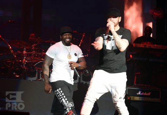 INDIO, CA - APRIL 15:  Curtis "50 Cent" Jackson (L) and Eminem perform onstage during the 2018 Coachella Valley Music and Arts Festival Weekend 1 at the Empire Polo Field on April 15, 2018 in Indio, California.  (Photo by Kevin Winter/Getty Images for Coachella)