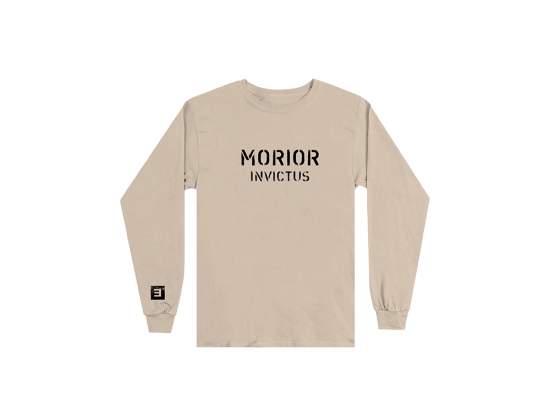 This is a pre-order and is expected to ship in 4-5 weeks. ﻿  Exclusive and limited Kamikaze merchandise.  Morior Invictus (Latin for "Death Before Defeat") printed in black on front chest center with E logo printed on right wrist of a sandstone long sleeve shirt.